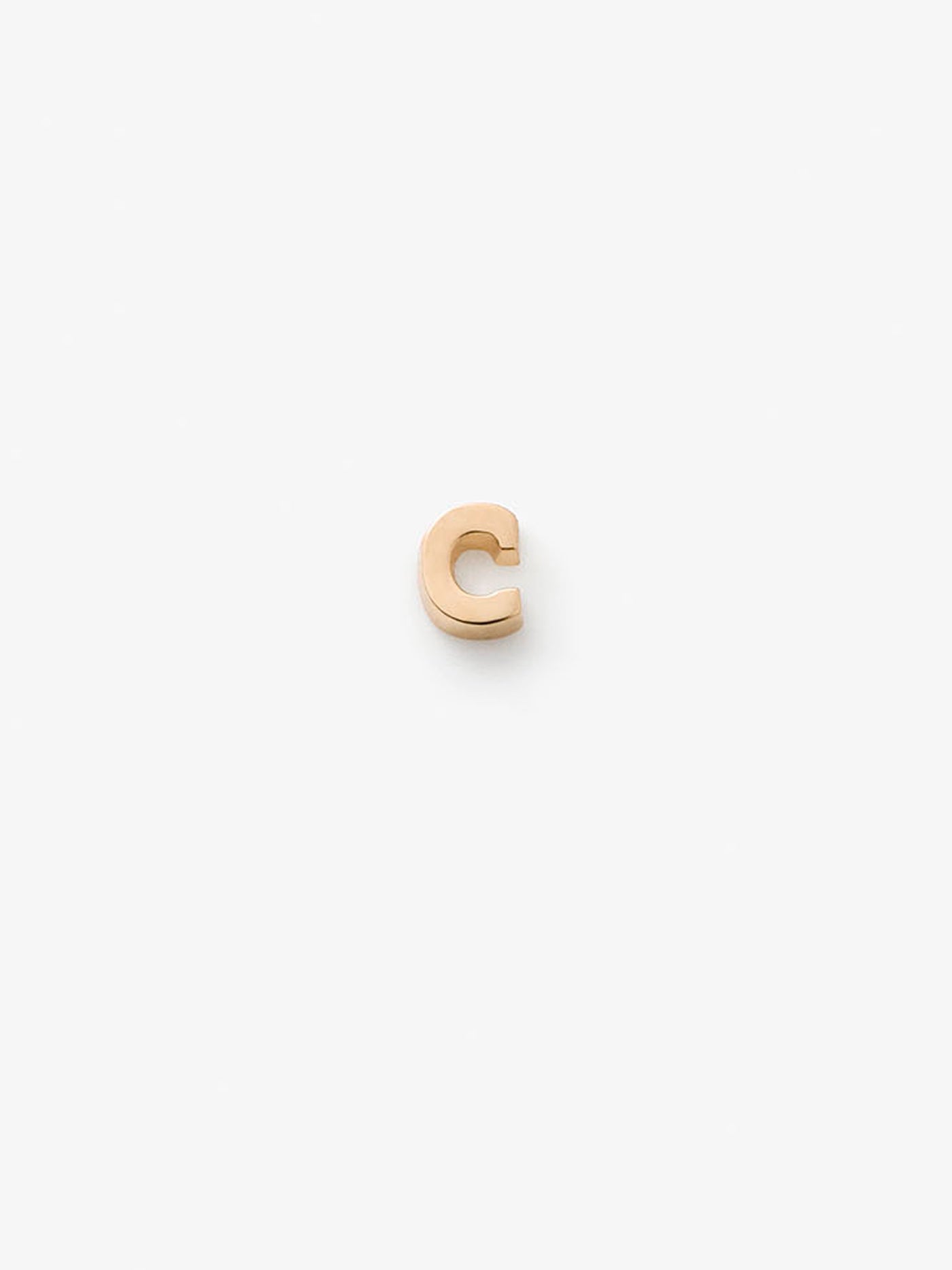Miniature letter C single stud earring in 18k solid gold with a butterfly fastening for pierced ears. 