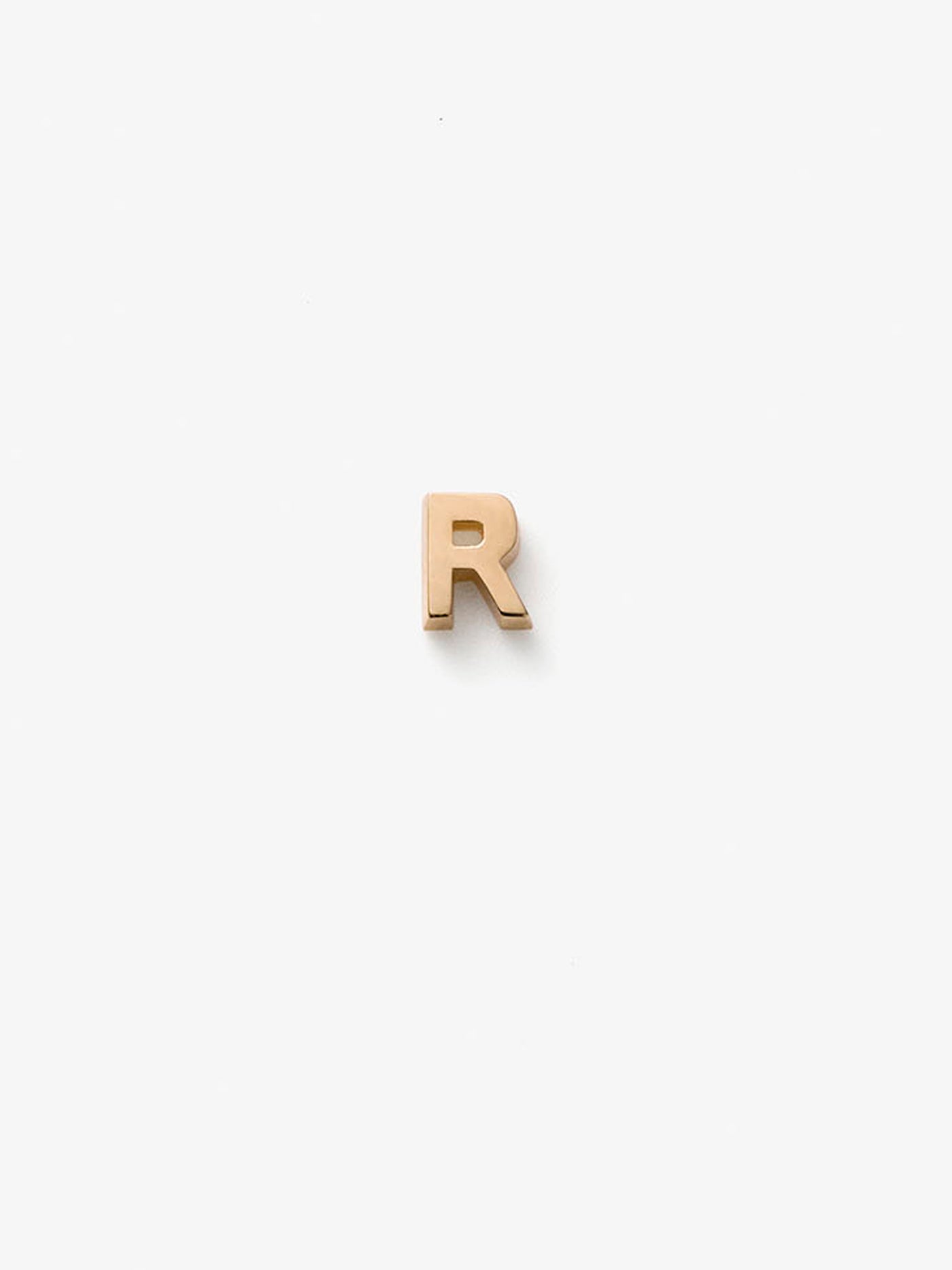 Miniature letter R single stud earring in 18k solid gold with a butterfly fastening for pierced ears