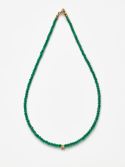 Hand-strung necklace with natural, faceted green onyx gemstones and miniature three-dimensional letter in 18k solid gold
