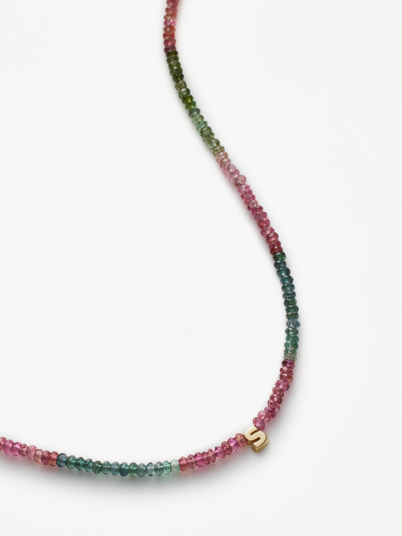 Hand-strung necklace with natural, faceted tourmaline gemstones and miniature three-dimensional letter in 18k solid gold